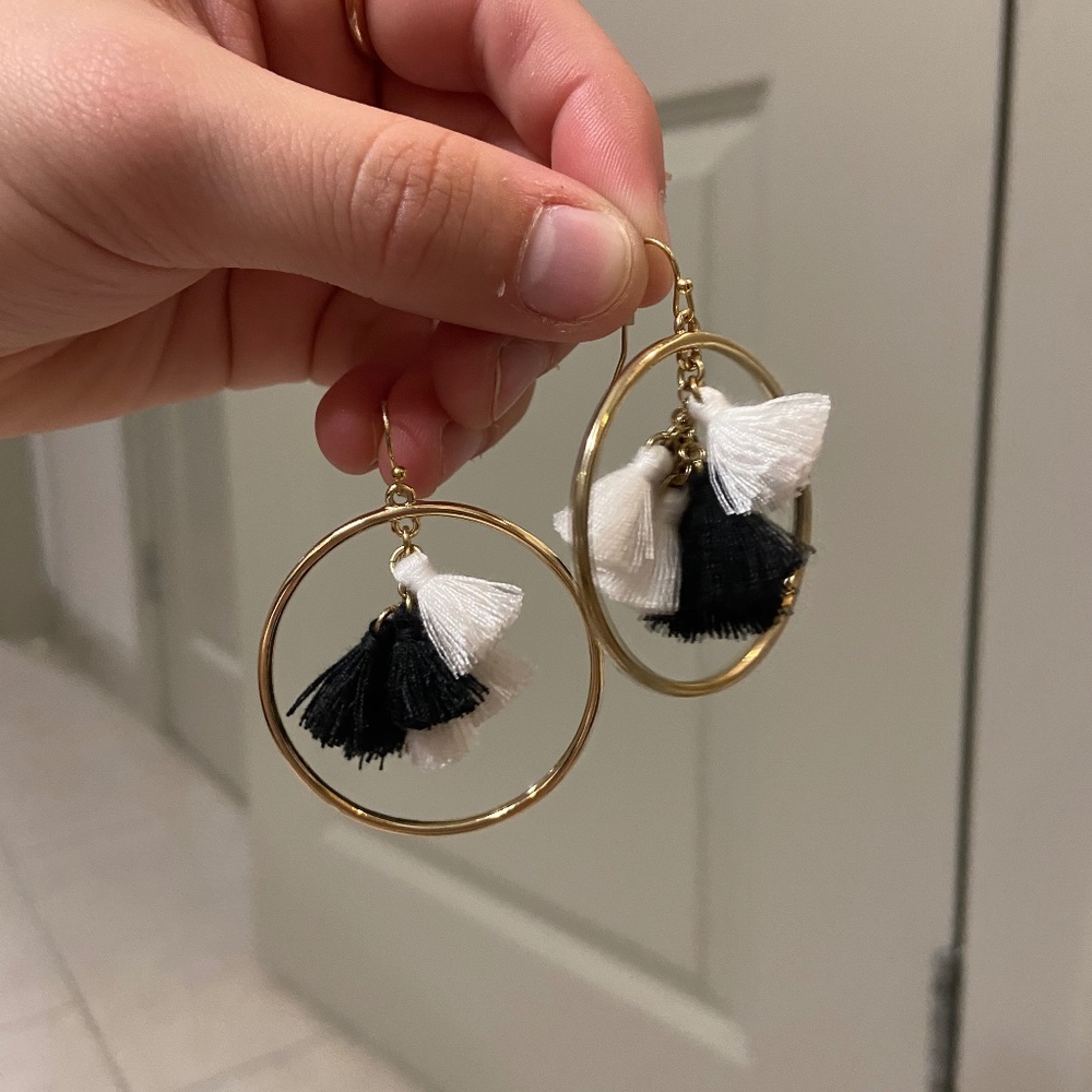 Black and white fluff with gold hoop earrings